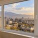 پنجره UPVC آپارتمان با چشم‌انداز شهر تهران و برج میلاد